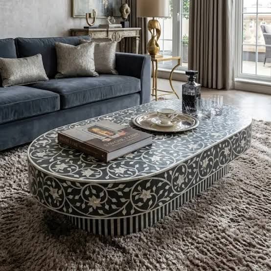 oval shape mother of pearl coffee table By Ashborn furniture